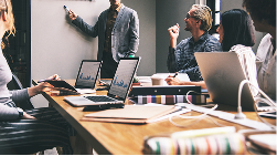 A diverse group of business people, representing type of business as a factor.