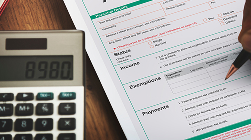 Insurance policy documents, representing coverage limits and deductibles as factors.